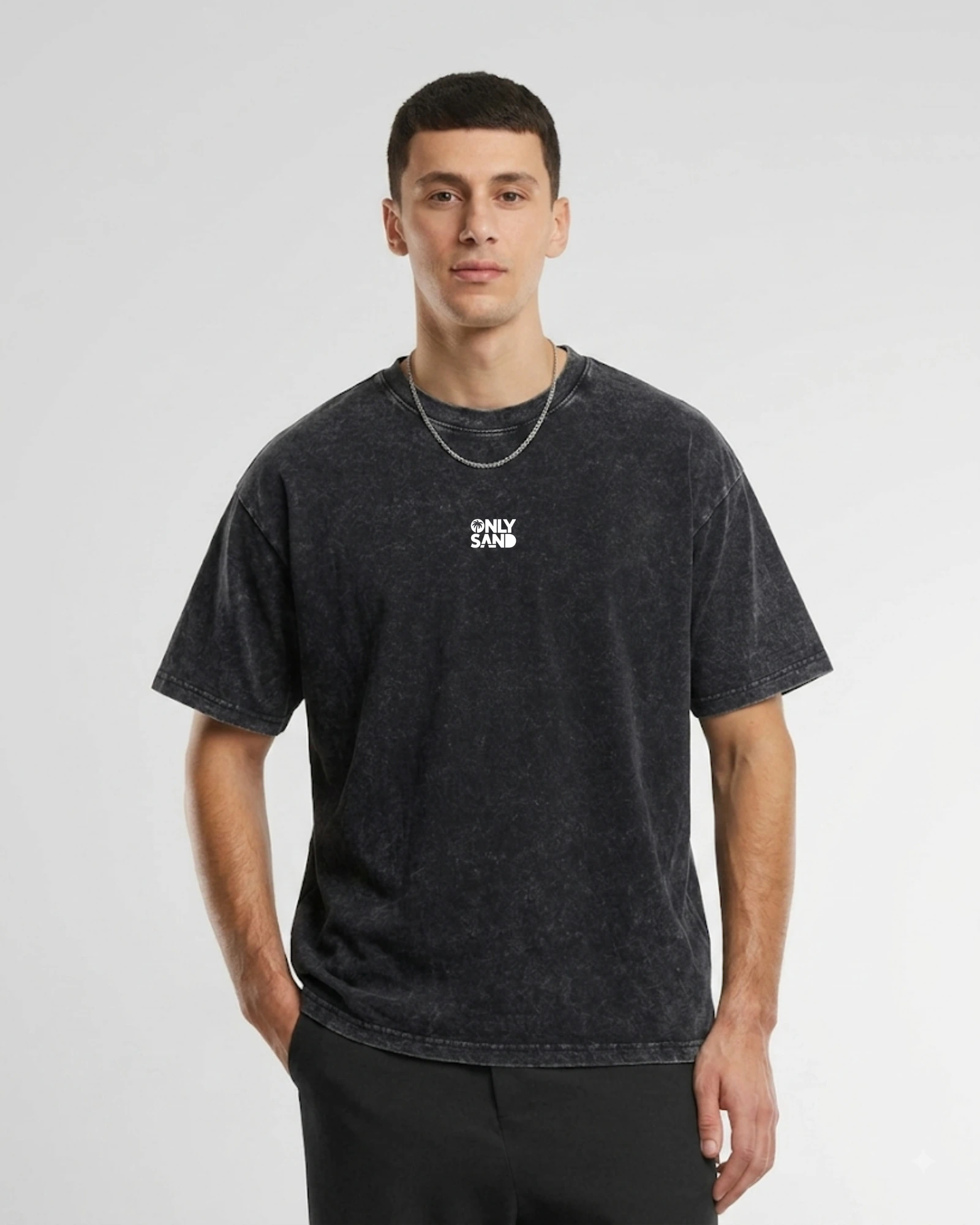 Front view of the SUN SAND SOCCER washed charcoal-black T-shirt with a small white ONLY SAND logo.